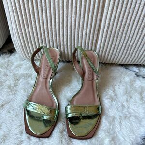 Metallic green sling back heels